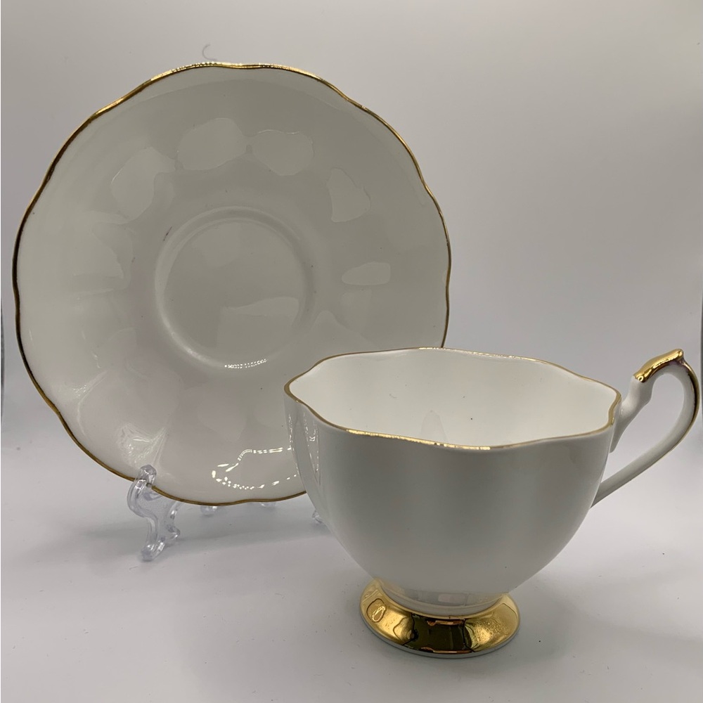 Elegant vintage White and Gold Queen Anne tea cup and saucer, bone china, englan